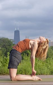Person doing yoga at Nature Boardwalk