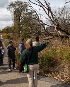 Zoo educator leading guests through Nature Boardwalk
