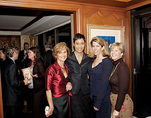 Women's Board members pose for a photo during an event