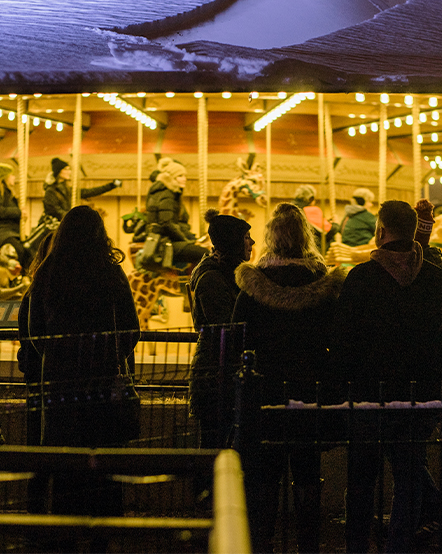 Guests wait in line for the AT&T Endangered Species Carousel