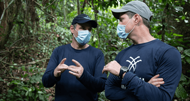 Dave Morgan, Ph.D., co-director of the Goualougo Triangle Ape Project, speaking with Stephen Ross, Ph.D. director of the Lester E. Fisher Center for the Study and Conservation of Apes in Africa.