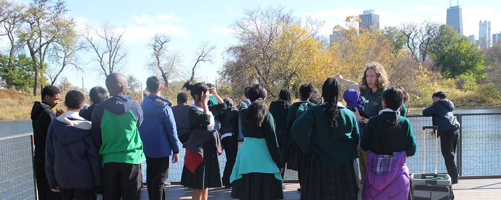 School children listening to a guided tour