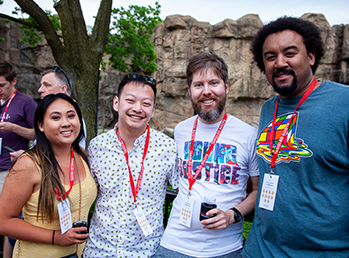 Guests posing for a photo at Craft Brews at the Zoo