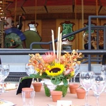 A dining tables near AT&T Endangered Species Carousel