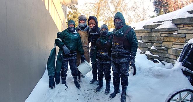 Animal Care staff working on a cold winter day