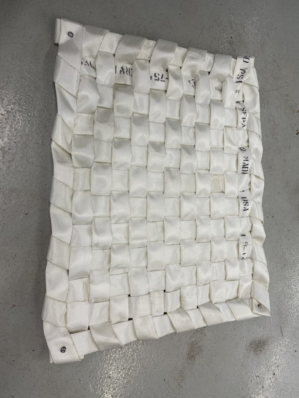 Mat made of firehose