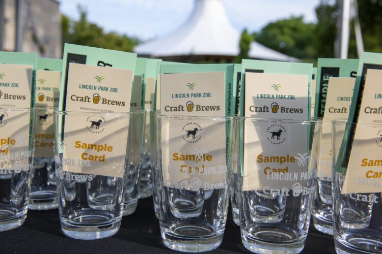 craft brews at the zoo a small glass with sampling cards inside