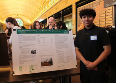 Partners in Fieldwork participant showing poster