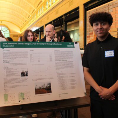 Partners in Fieldwork participant showing poster